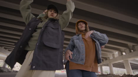 dance crew under a bridge