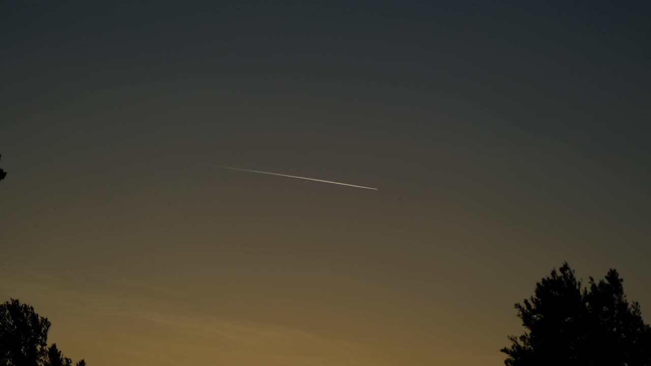 footage of airplane flying in sky in windy weather