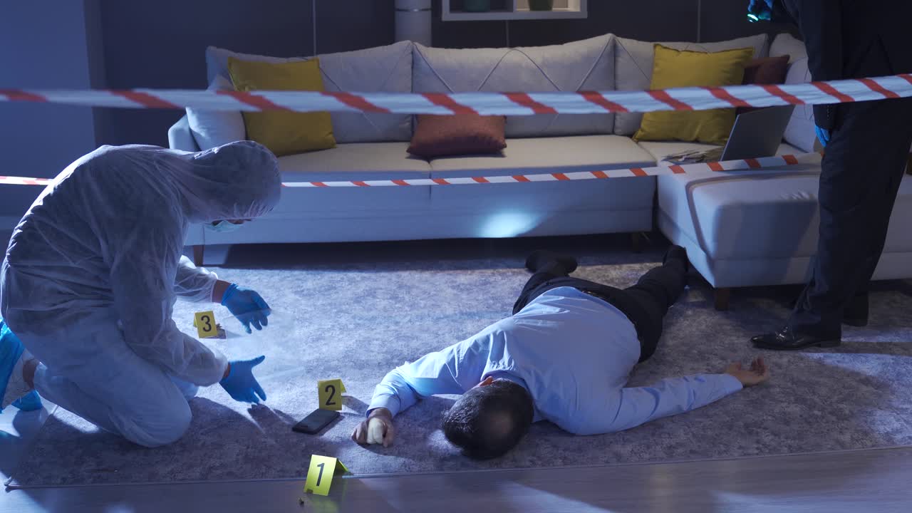 The forensic scientist puts the evidence from the crime scene in a plastic bag.