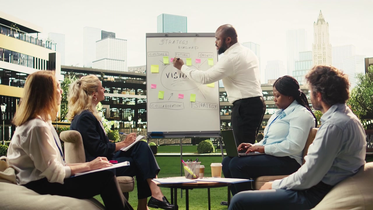 Diverse Business Team Collaborating on Strategy in Modern Office