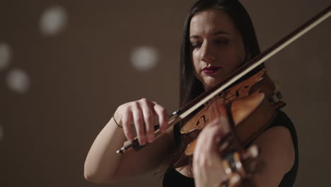 woman playing violin