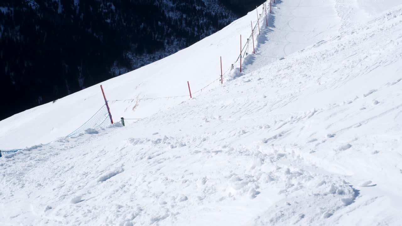 Snowy Ski Slope in Mountain Range