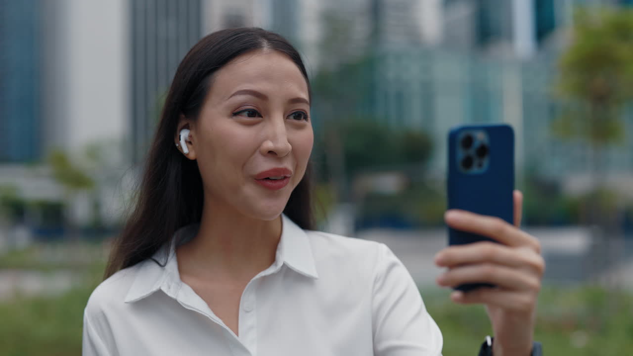Businesswoman on Video Call in the City
