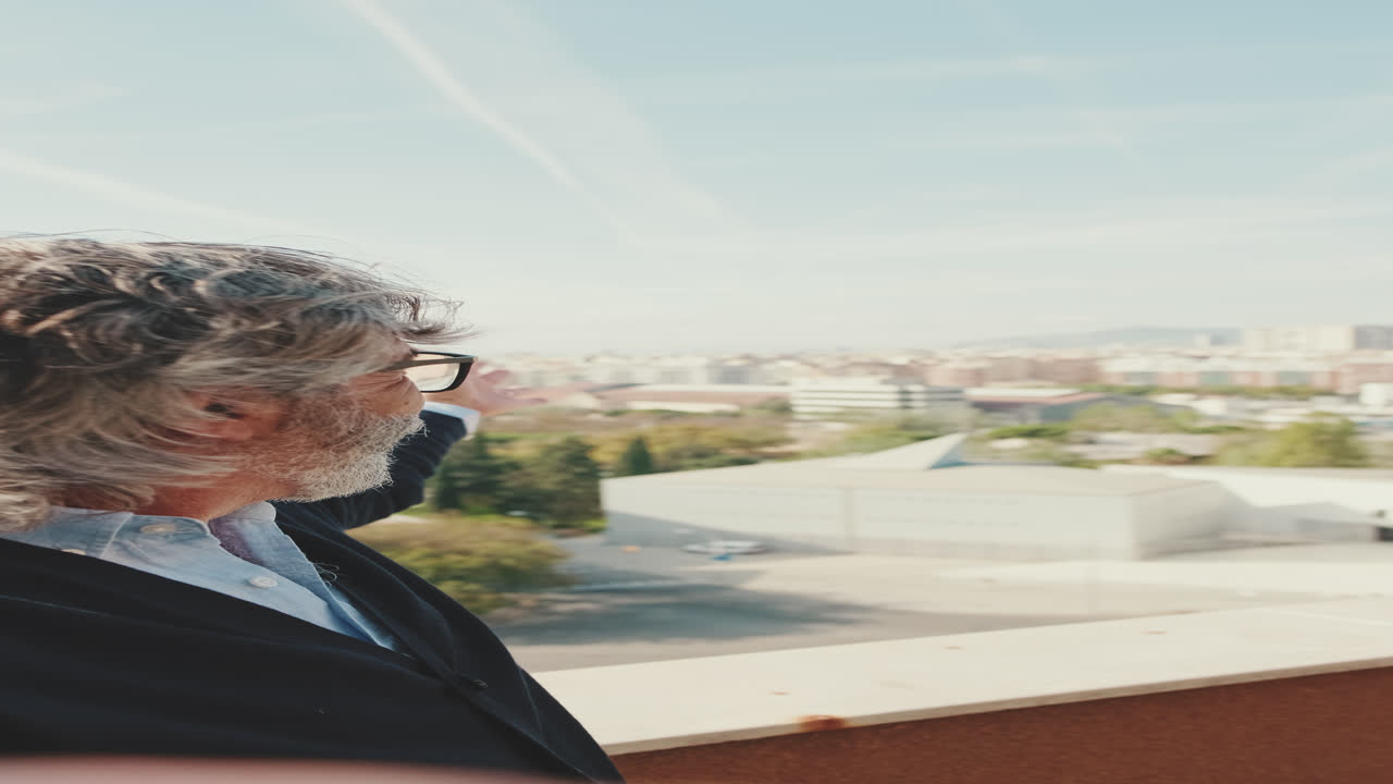 Man on Rooftop with City View