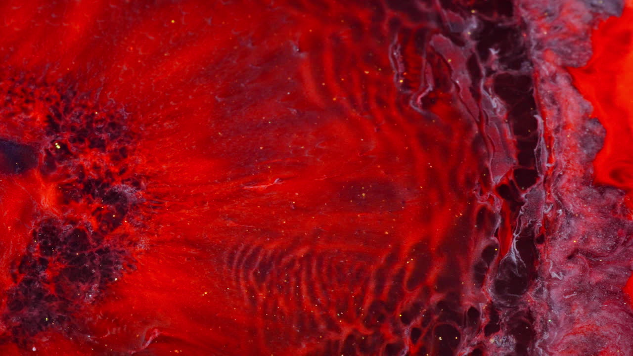 Red abstract backgrounds with organic forms made with colorful inks