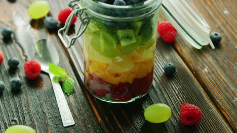 fresh fruits in glass jar