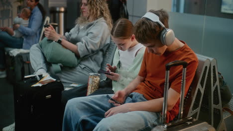 family waiting at airport