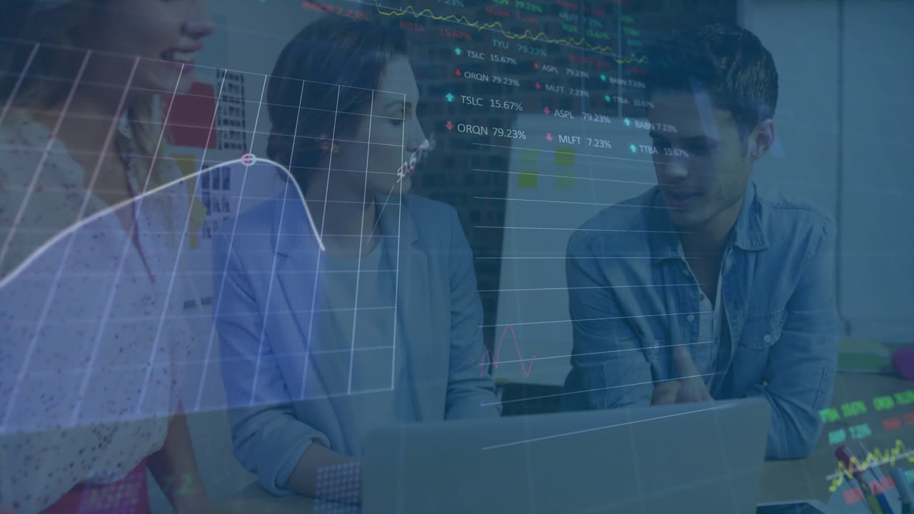 Discussing data, business professionals analyzing financial graphs in office meeting