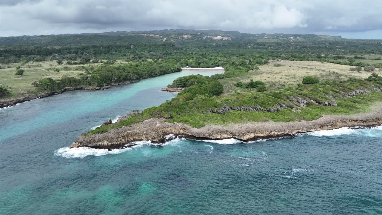 Aerial view around the rocky bay at Playa Caletón in Rio San Juan, Dominican republic