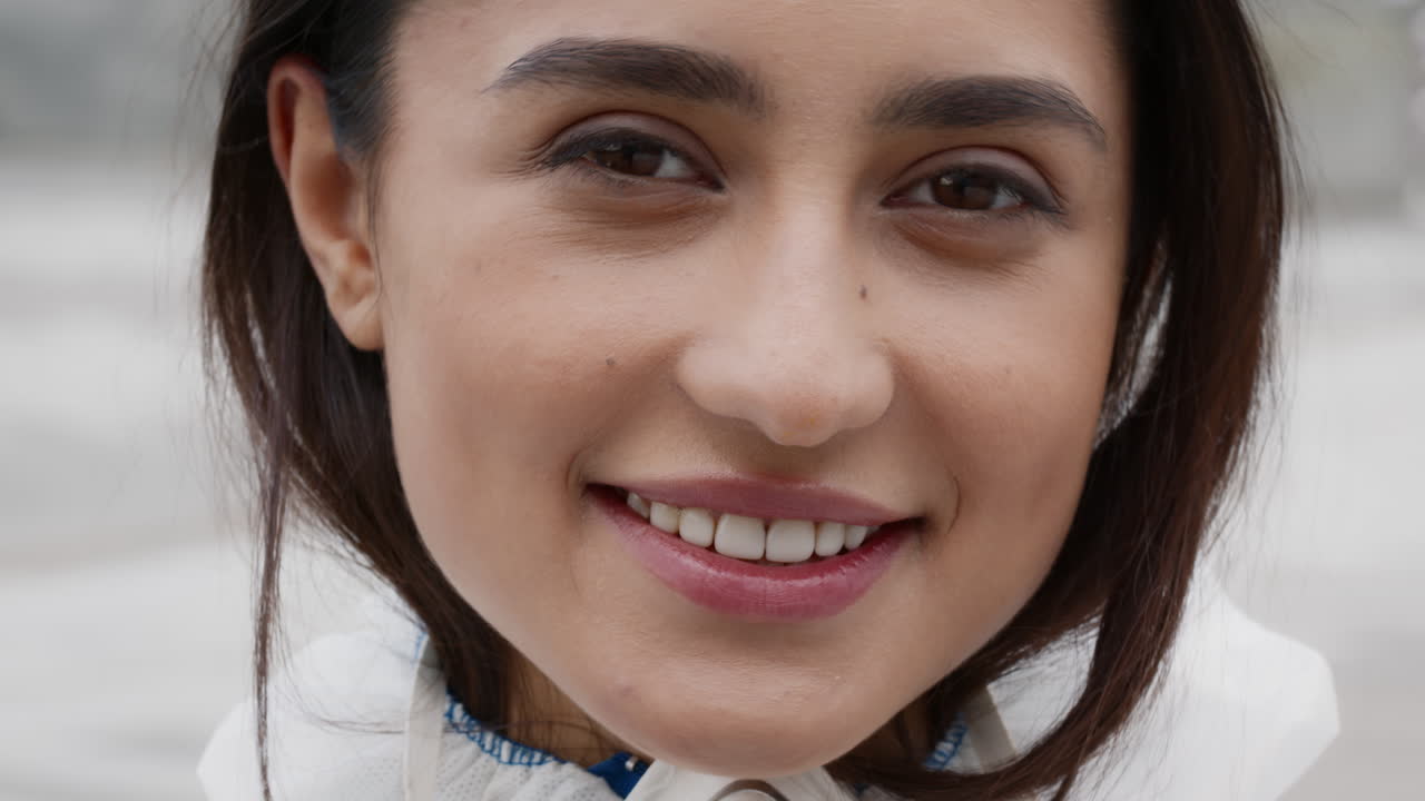 Woman in Protective Gear Smiling
