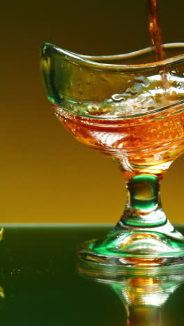 pouring liquid into a glass bowl