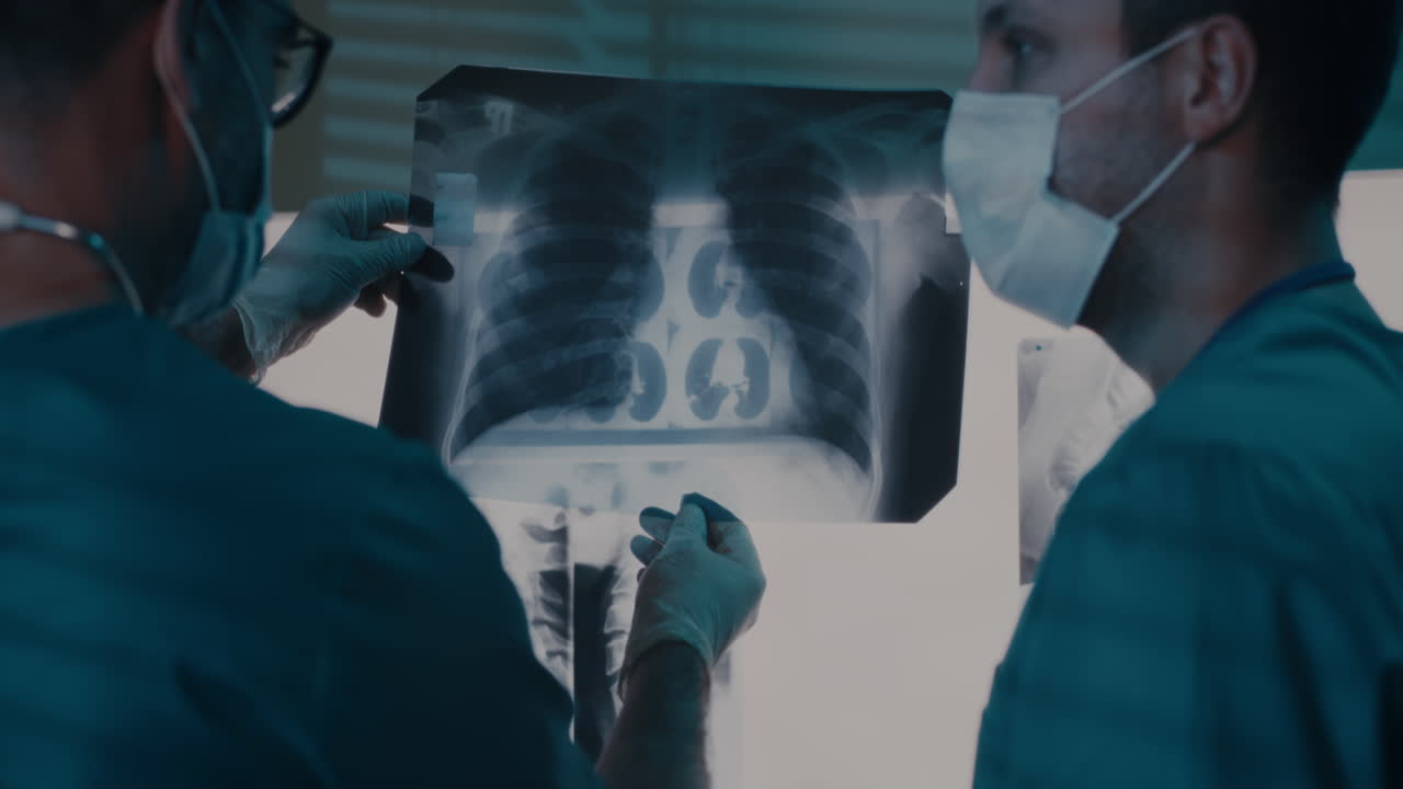 Doctors Reviewing X-Ray Image