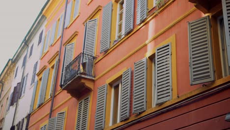 Colorful Italian Building Facade with Shutters