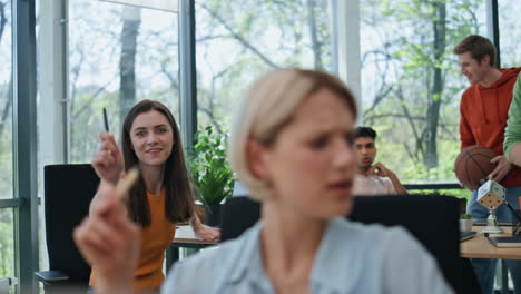 creative group discussing startup business meeting closeup. diverse team talking