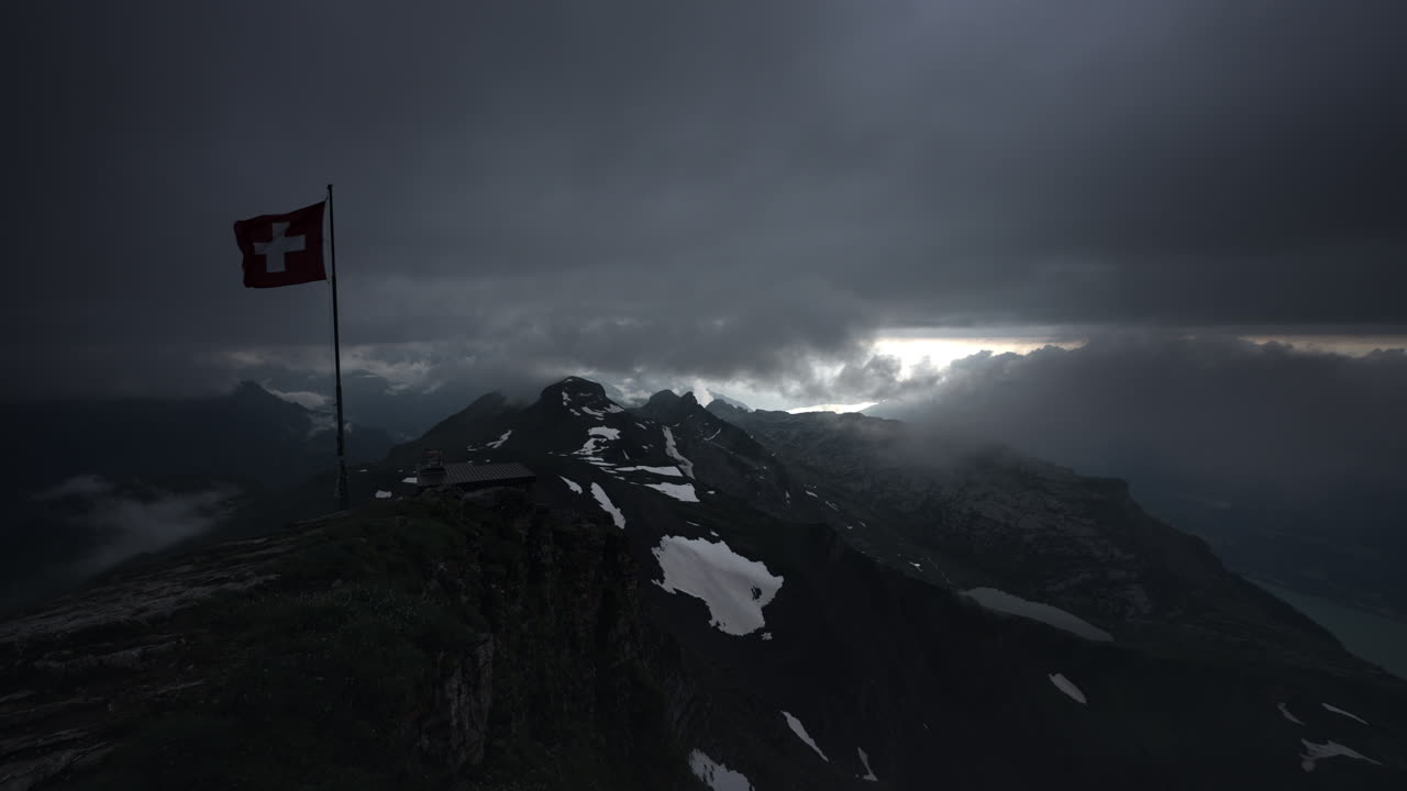 Swiss Alps Mountain Peak Under Stormy Clouds