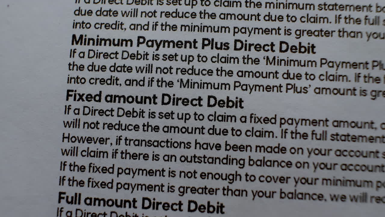 Close-up of text regarding payment methods, slow zoom out reveals more details