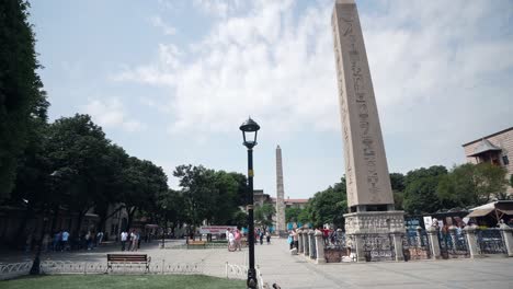 people walking at sultan ahmet square (the old hippodrome of constantinople), famous tourist attraction and landmark of istanbul's historic peninsula