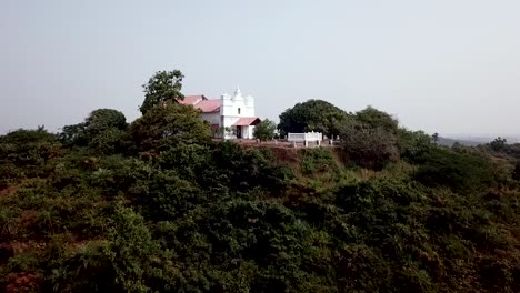 drone shot over three kings church, south goa, india