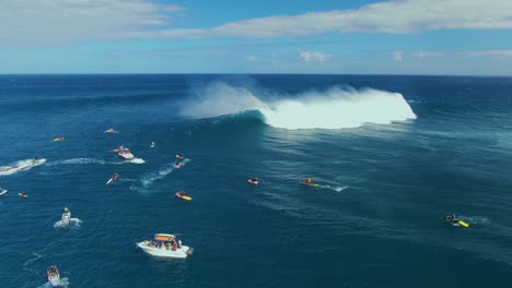 giant waves rolling over deep blue sea surface, surfers staying ready for right moment to ride the ideal wave