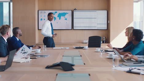 black man, office and meeting in presentation