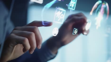 hands interacting with a holographic display