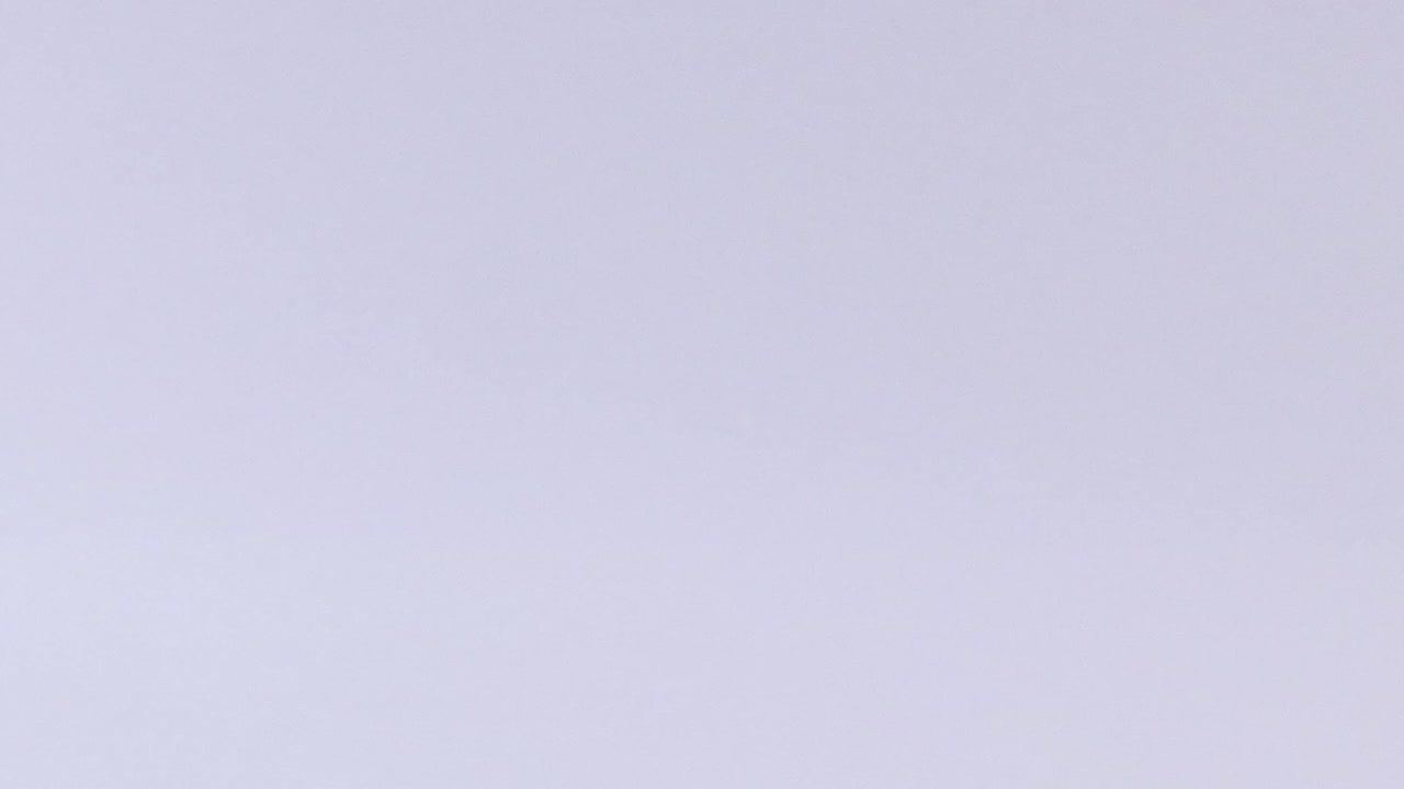 A series of images showing a yellow tennis ball in various mid-air positions against a plain background.