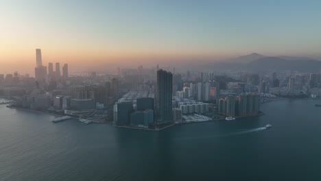 4k aerial view footage of hong kong city in sunset