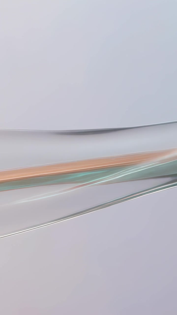 Vertical video: Glass arc sliding left in-studio at start over pale wall revealing filament, glints