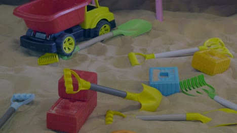 a sandbox with toys