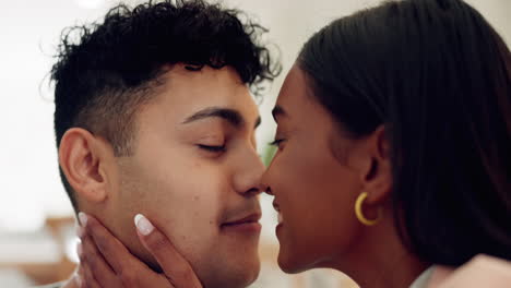 couple in living room, kiss