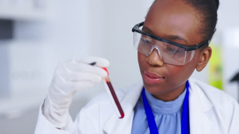 Blood-test,-research-and-scientist-woman-with-tube