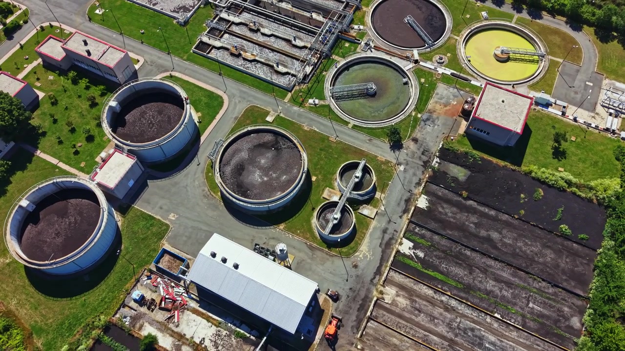 Water treatment facility processes wastewater in an urban area during daylight hours to ensure clean water supply for the community