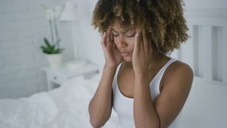 woman suffering from headache