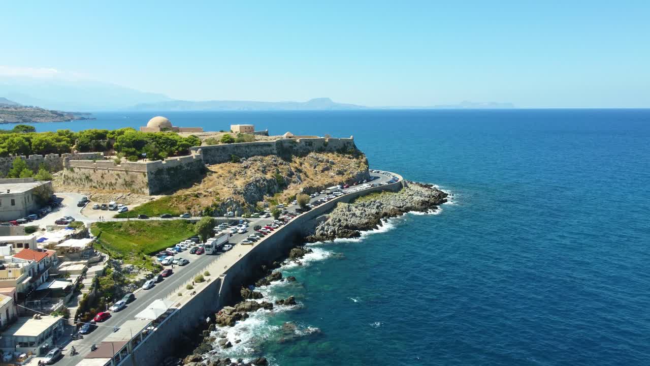 Fortezza fortress perched above the rocky Aegean coastline in Rethymno, Crete