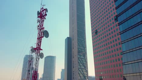 telecommunication antennas and sckyscrapers in mexico city