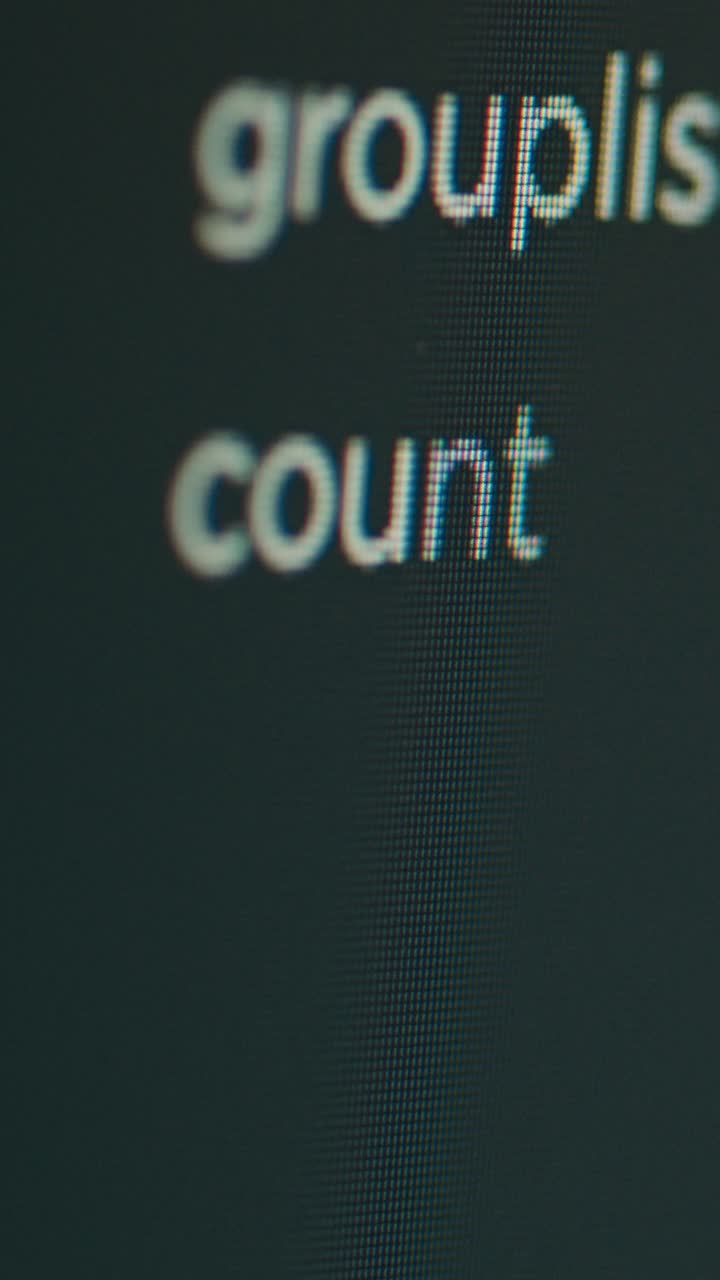Vertical video: Security database written on computer monitor to develop programming language