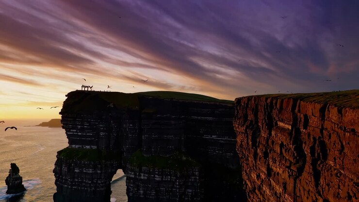 Dramatic Sunset Over Majestic Coastal Cliffs