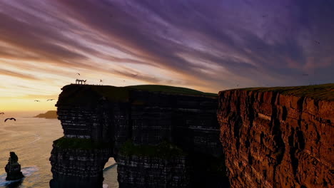 dramatic sunset over majestic coastal cliffs