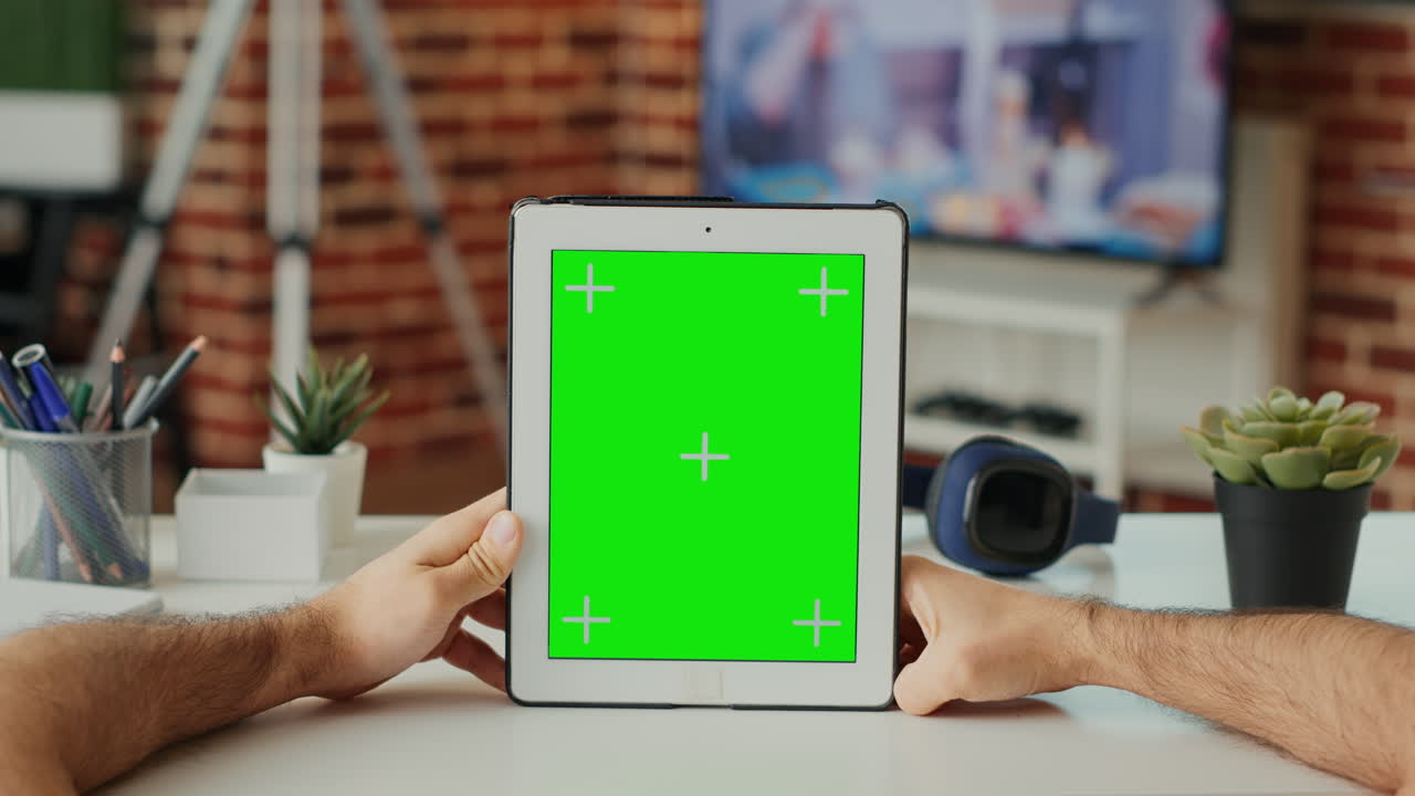 Caucasian manager using digital tablet with greenscreen template