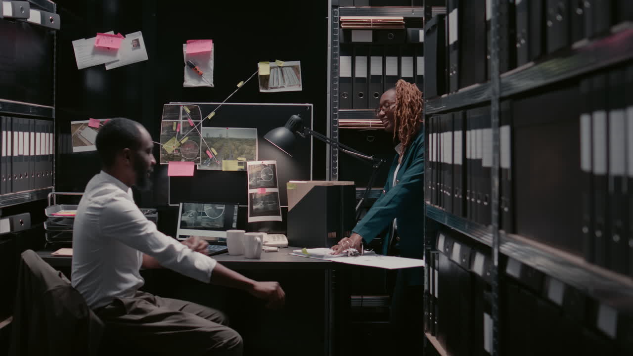 Detectives working in the office