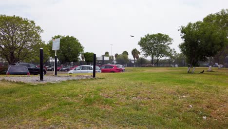 parking lot of an industrial park with big areas of green grass a