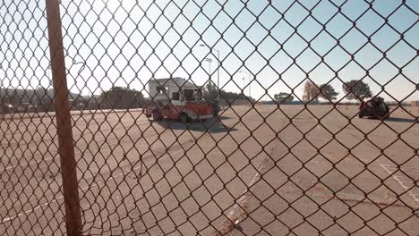 crushed and wrecked cars litter an emergency training and preparation area