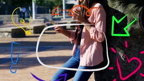 iconos digitales flotando contra una mujer tomando una bebida y usando un teléfono inteligente en el parque