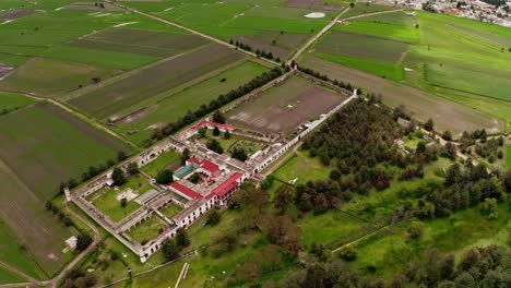 aerial drone orbit around luciernagas estate in mexico city