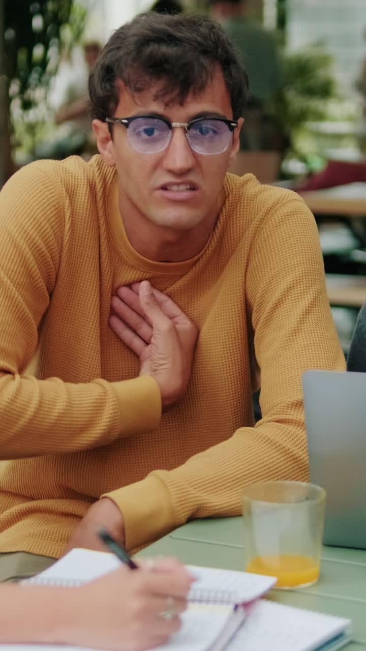 Close up of a diverse group of students using computer. Focus on the African