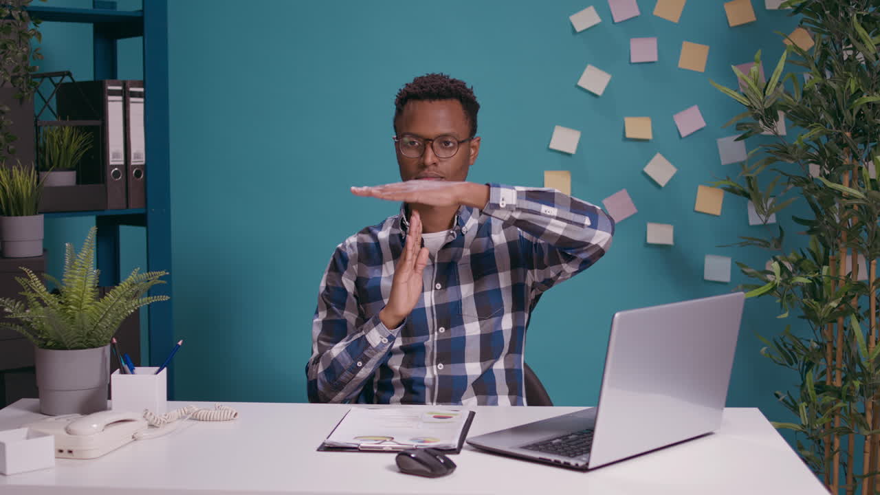 African american man doing t shape sign with hands