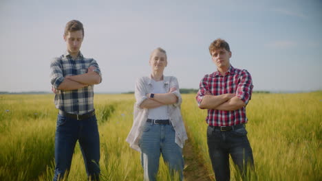 three farmers in a wheat field