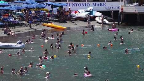 people swimming and relaxing at sorrento beach