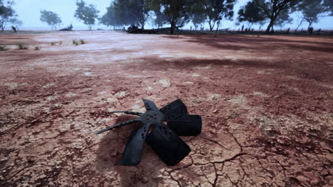 abandoned fan in a dried-up outback landscape