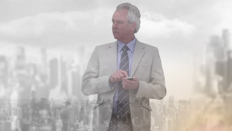 digital composition of senior caucasian businessman using smartphone against cityscape in background